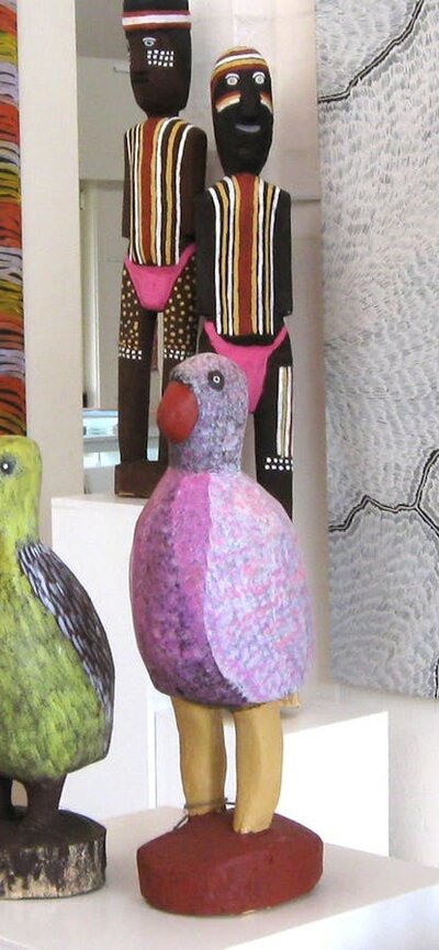 Large carved birds and ceremonial figures by Utopia artists, Aboriginal art paintings.